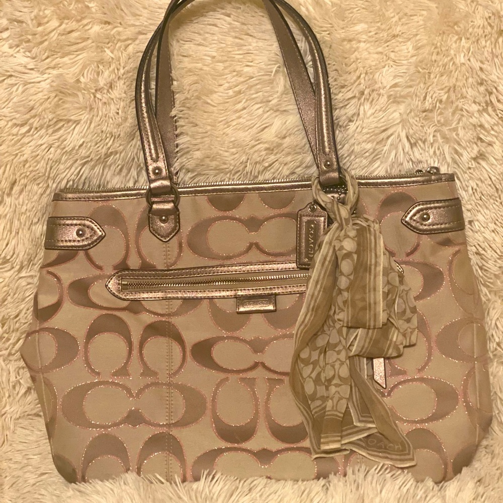 Gently used Coach Purse. Tan and Pink.